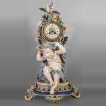 Polychrome earthenware pendulum, Cupid supporting the dial