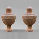 A pair of Louis XVI period vases made out of cast iron