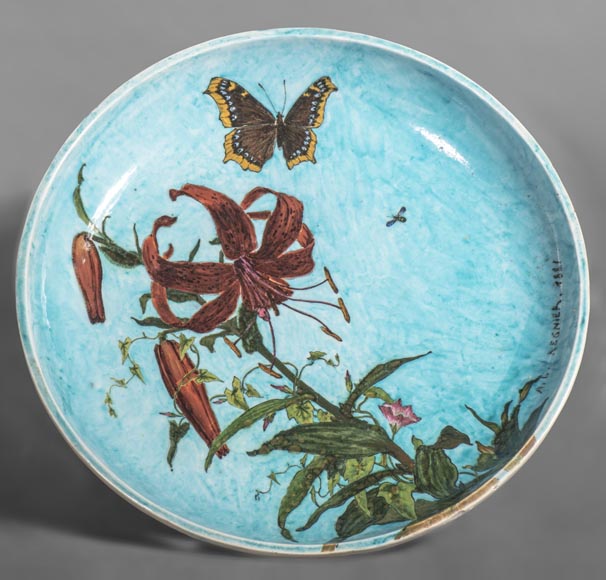 Théodore DECK (ceramist) and Anthony Ludovic REGNIER (painter) - Ceramic dish glazed with striped lily and butterfly on a blue background-0