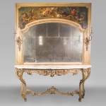 An antique console and its mirror, in Louis XV style, with parrots