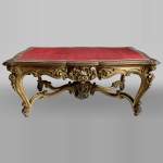 Louis XV style table in gilt and sculpted wood, 19th century
