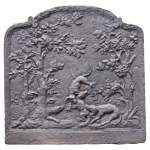 Cast iron fireback with a hutting scene decoration