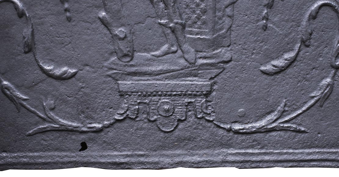 Small antique fireback with soldier in armor decoration-4