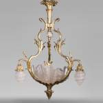 Antique chandelier in the Regency style with shells