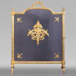 Fire screen in gilt bronze with Satyr mask