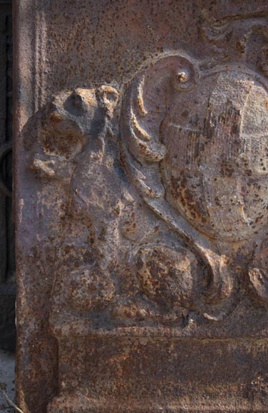 An old 18th century fireback with coat of arms and sitting lions-3