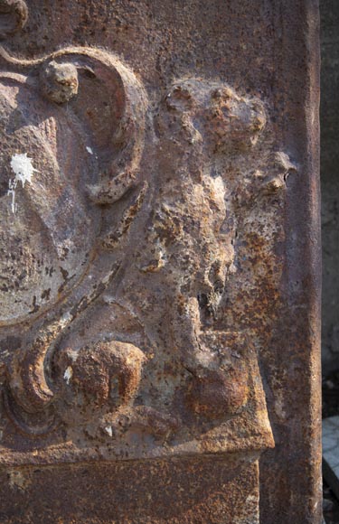 An old 18th century fireback with coat of arms and sitting lions-4