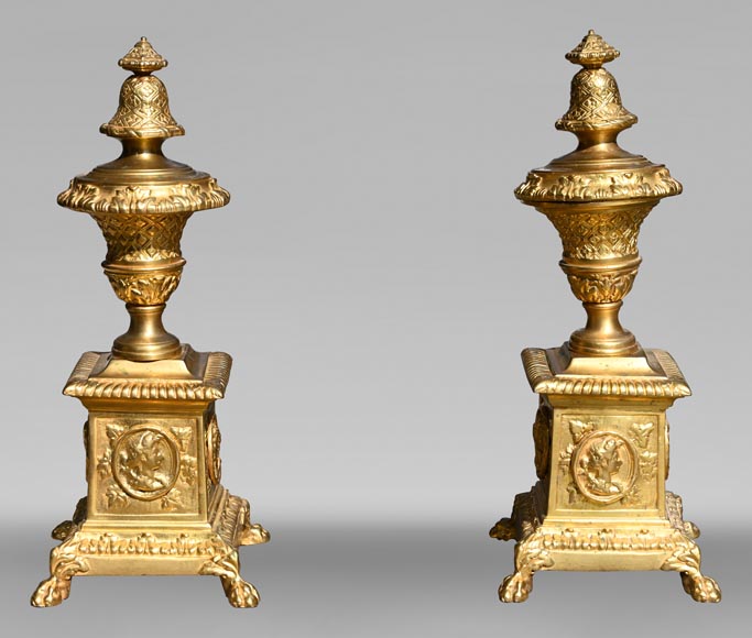 Pair of Louis XIV style gilt-bronze chenets decorated with profiles.-0