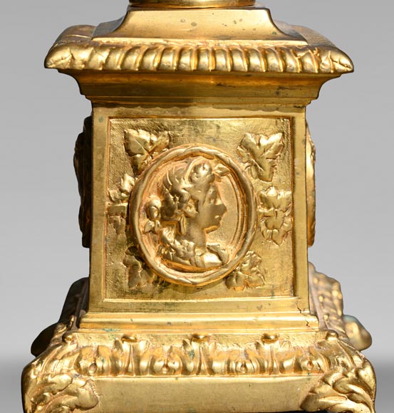 Pair of Louis XIV style gilt-bronze chenets decorated with profiles.-2
