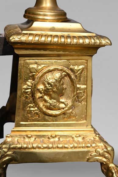 Pair of Louis XIV style gilt-bronze chenets decorated with profiles.-6