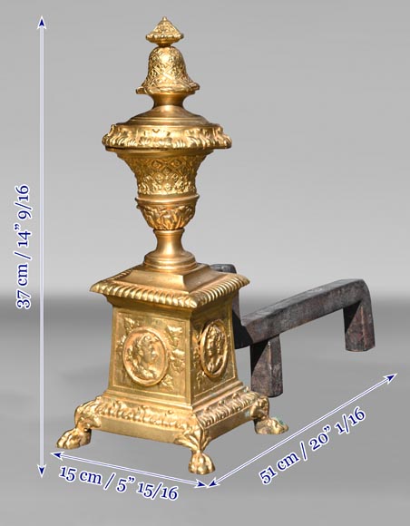 Pair of Louis XIV style gilt-bronze chenets decorated with profiles.-7