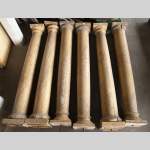 Set of wooden columns painted in imitation marble