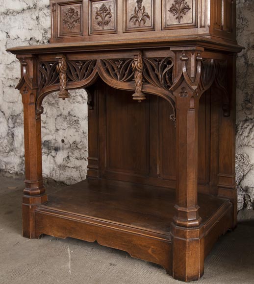 Pair of Neo-Gothic style carved walnut sideboards-4