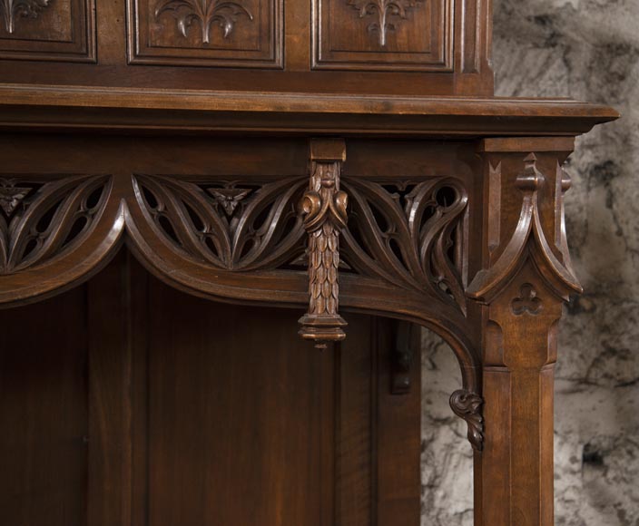 Pair of Neo-Gothic style carved walnut sideboards-6
