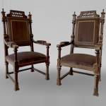 Pair of neo-gothic style armchairs in walnut