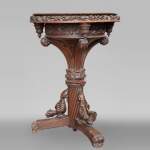 Small Neo-Gothic stand in oak with a rich sculpted decor
