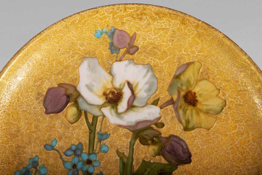 MANUFACTURE DE SÈVRES - WALTER Glazed ceramic plate decorated with flowers on a gold background-1
