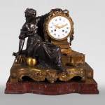 Maison Denière - Patinated and gilded bronze clock symbolizing Uranie