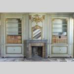 Louis XVI style paneled room comprising a Louis XVI period mantel and its trumeau