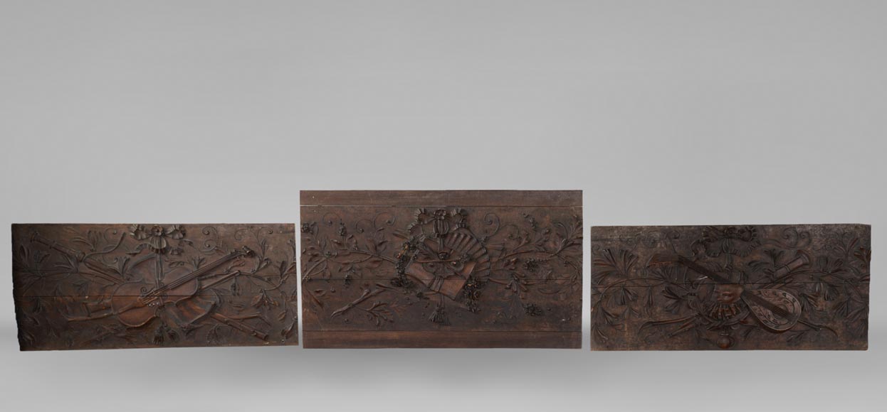 Set of three antiques carved walnut decorative panels with attributes of the Arts-0