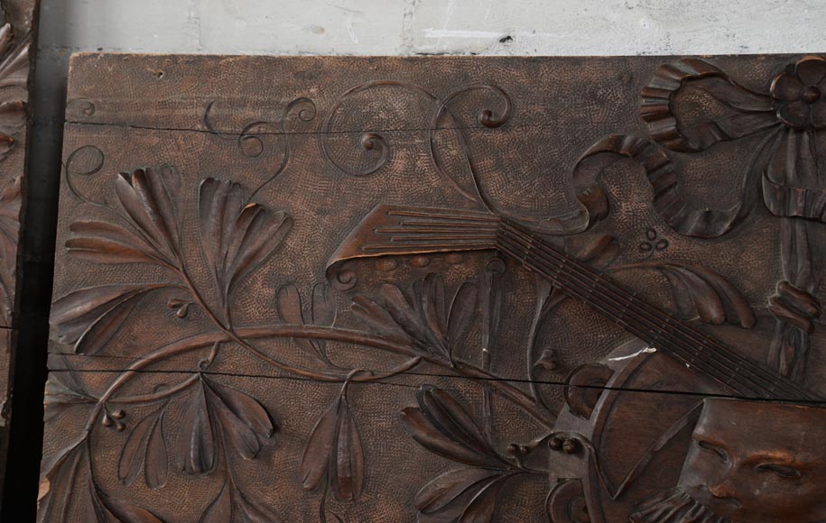 Set of three antiques carved walnut decorative panels with attributes of the Arts-11