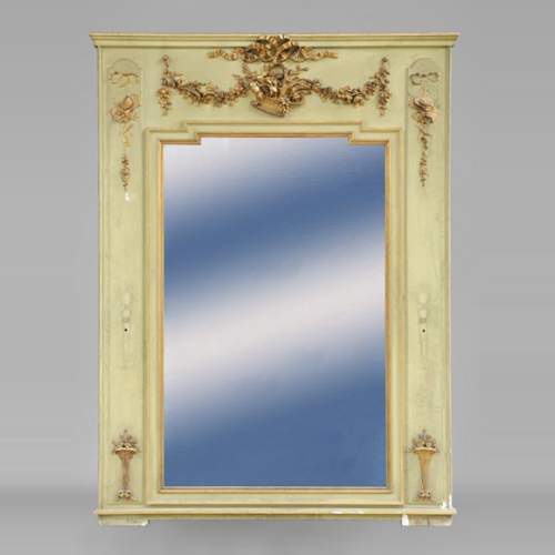 Beautiful antique Louis XVI style pier glass with basket decor and flowers in gilded stucco and green lacquer