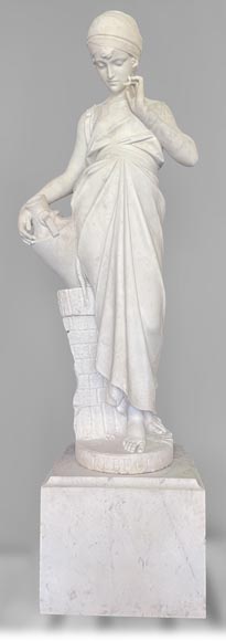 Two white marble statues representing 