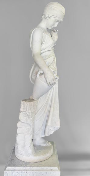 Two white marble statues representing 