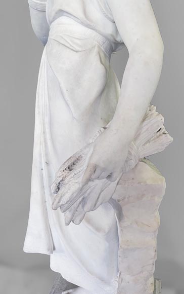 Two white marble statues representing 