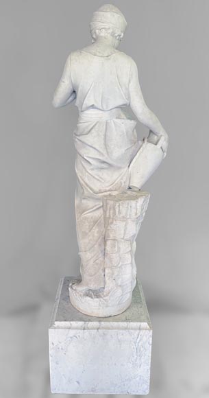 Two white marble statues representing 