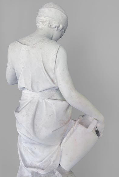 Two white marble statues representing 