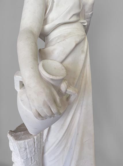 Two white marble statues representing 
