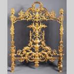 Antique Neo-Renaissance style fire screen in gilt bronze with chimera decoration
