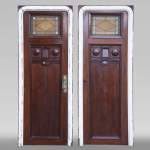 Pair of Art Deco style doors in mahogany, openworked with stained glass, probably from a boat cabin