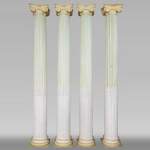 Set of four Ionic columns in painted plaster