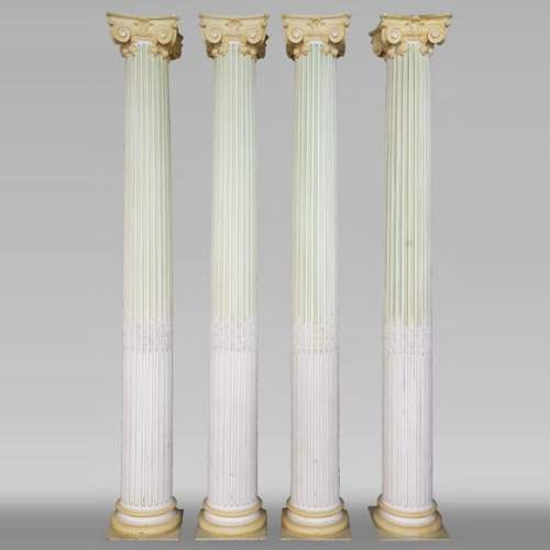 Set of four Ionic columns in painted plaster