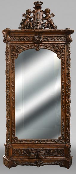 TAHAN (attributed to) — Large carved walnut armoire with mirror and naturalist decoration TAHAN (attributed to) — Large carved walnut armoire with mirror and naturalist decoration-0