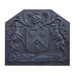 Hexagonal cast iron fireback with coat of arms