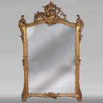 Antique Louis XV style trumeau in gilded wood