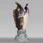Earthenware umbrella holder representing a fish coming out of a wave