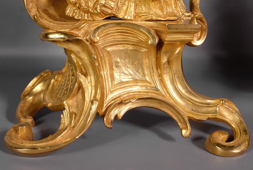 Pair of antique Louis XV style gilt bronze andirons with
