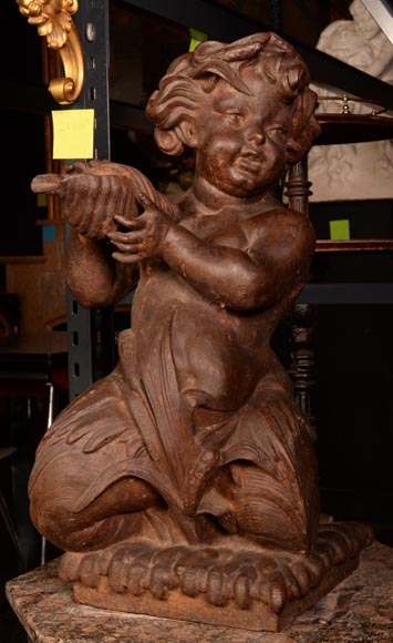 Cast iron statue fountain representing a child with a shell-1
