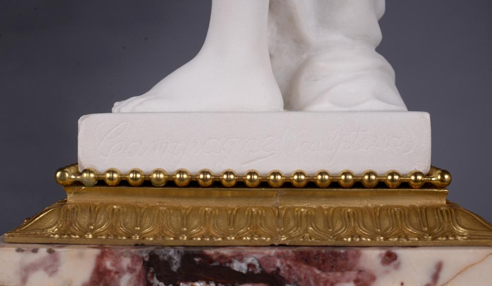 Peach blossom marble and gilt bronze clock surmounted by a statuary white marble   sculpture representing Phryne in front of his judges, signed 