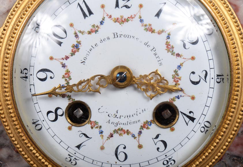 Peach blossom marble and gilt bronze clock surmounted by a statuary white marble   sculpture representing Phryne in front of his judges signed 