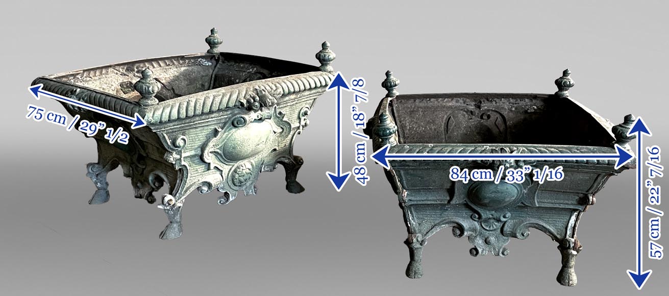 Pair of cast iron planters decorated with cartouches and lion heads Pair of cast iron planters decorated with cartouches and lion heads-9