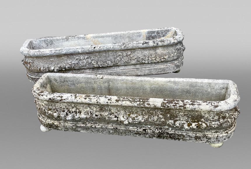 Pair of rectangular stone planters, decorated with floral scrollwork.-0