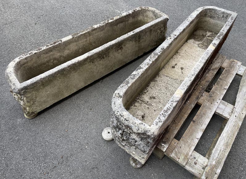 Pair of rectangular stone planters, decorated with floral scrollwork.-1
