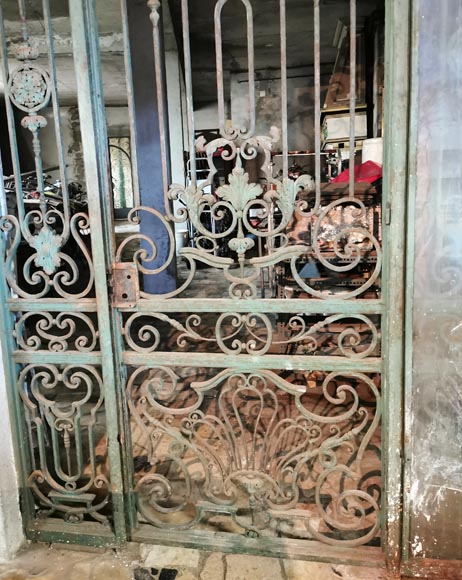 Old wrought iron entrance door of a Napoleon III period mansion.-4