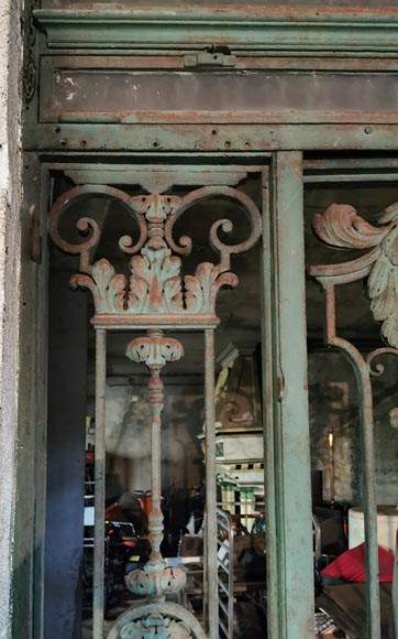 Old wrought iron entrance door of a Napoleon III period mansion.-5