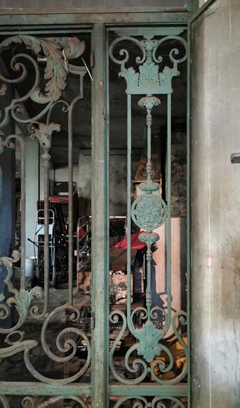 Old wrought iron entrance door of a Napoleon III period mansion.-6